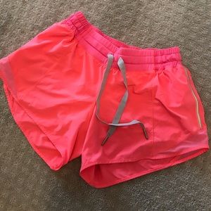 Bright Orange Lululemon running shorts